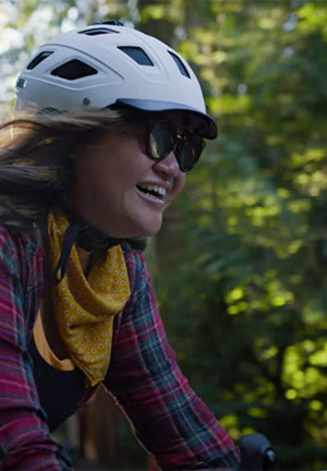 person riding on bike laughing